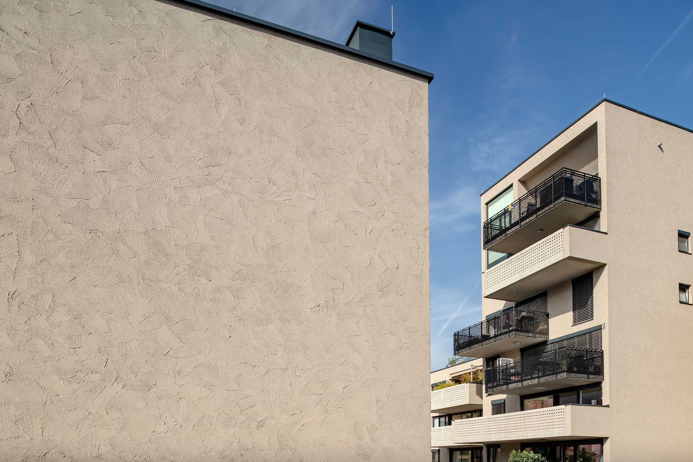 Fasadni omet s strukturo zidarske žlice: Stolit Effect® kot StoSignature Texture, Innsbruck